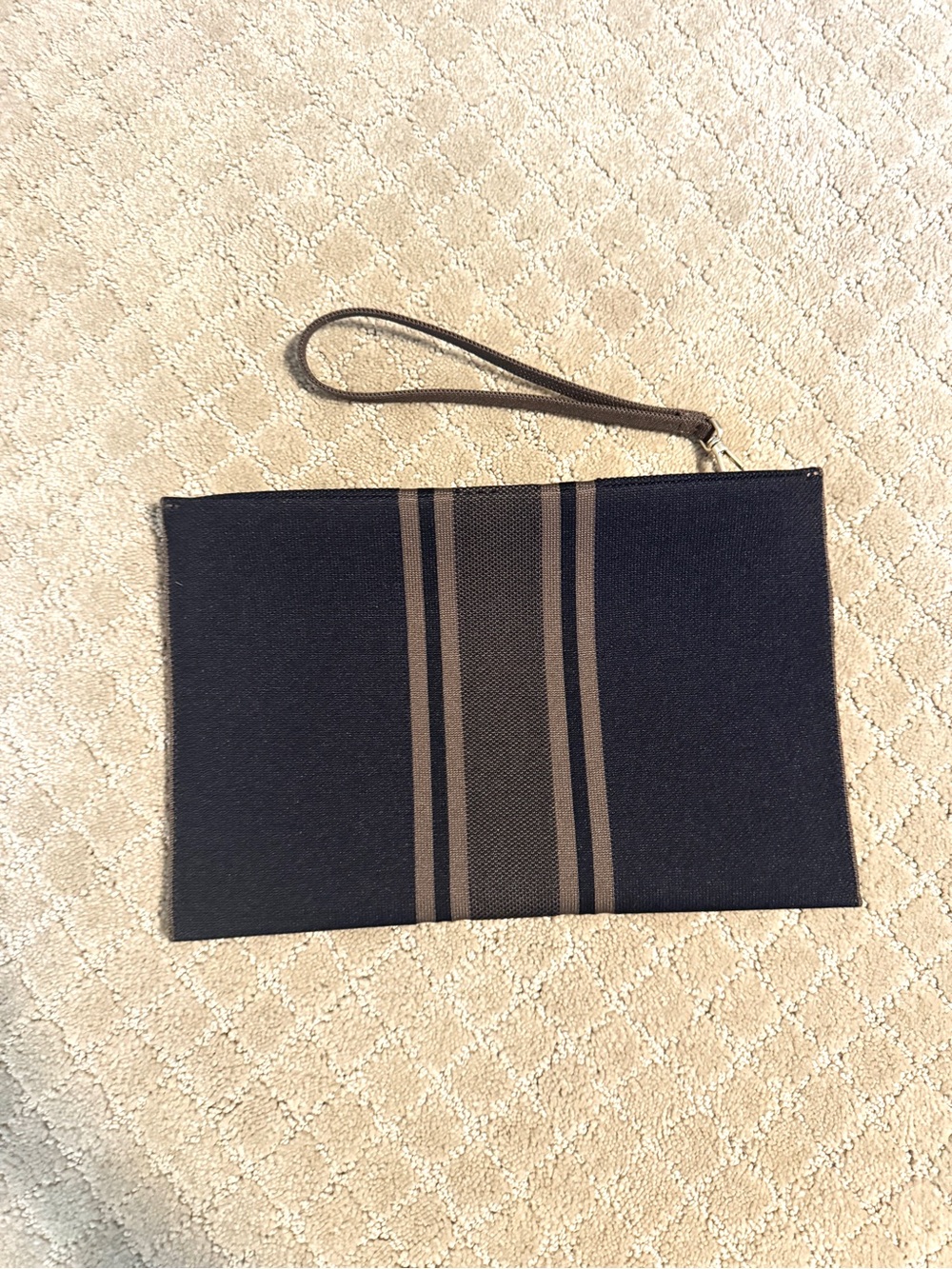 Rothy's Black Toiletry Wristlet with Brown Center Stripes